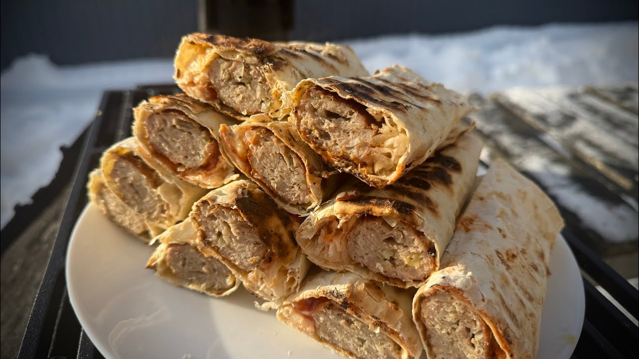 Kebab in pita bread on the grill.