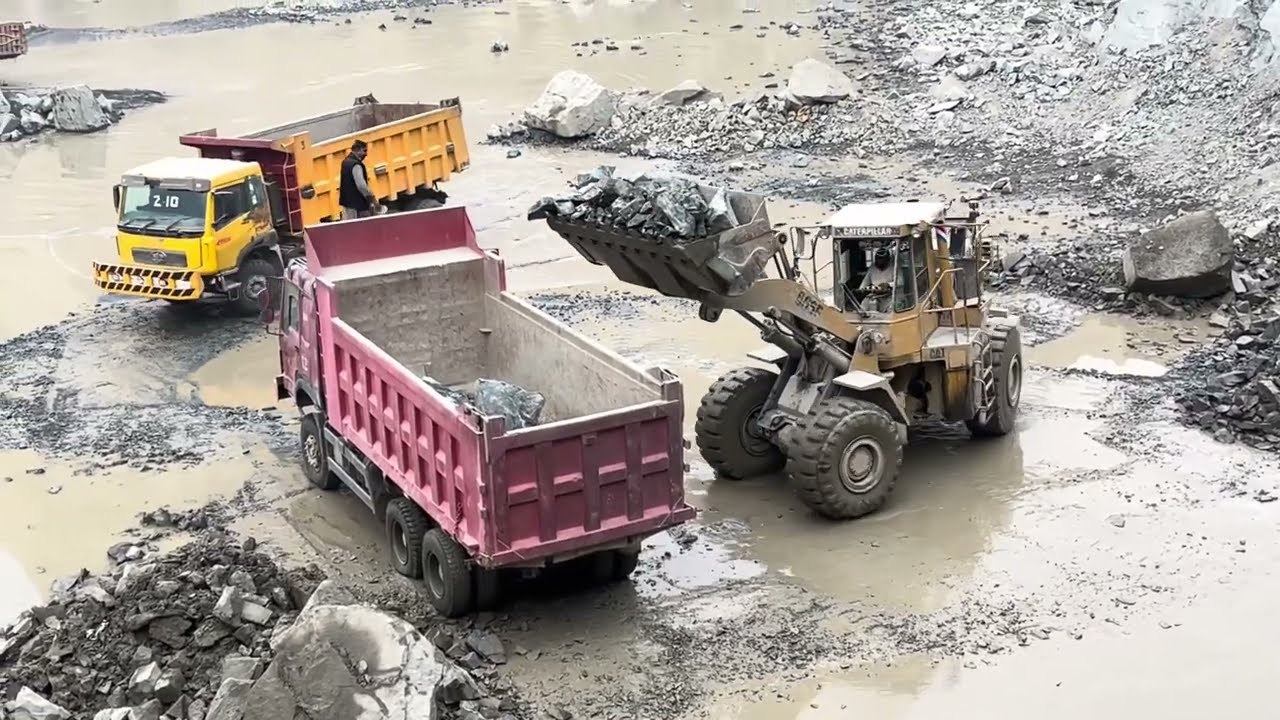 Caterpillar 966D Wheel Loader Loading Huge Rocks into Dump Truck | Powerful Quarry Heavy Machinery 