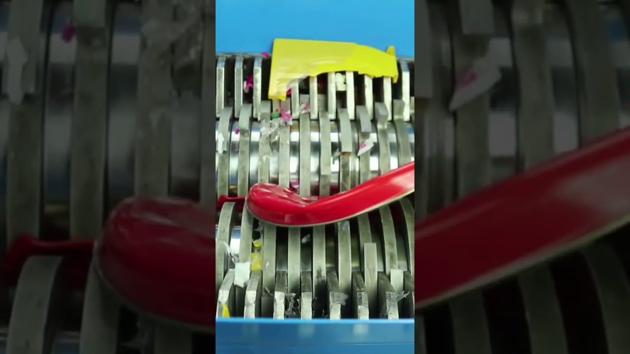 Shredding large biscuit tin #shreddingmachine #shredder
