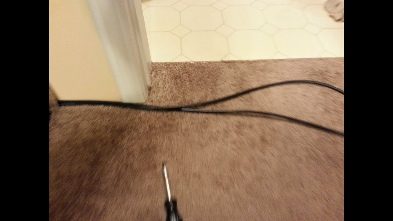 How to hide wires under the carpet