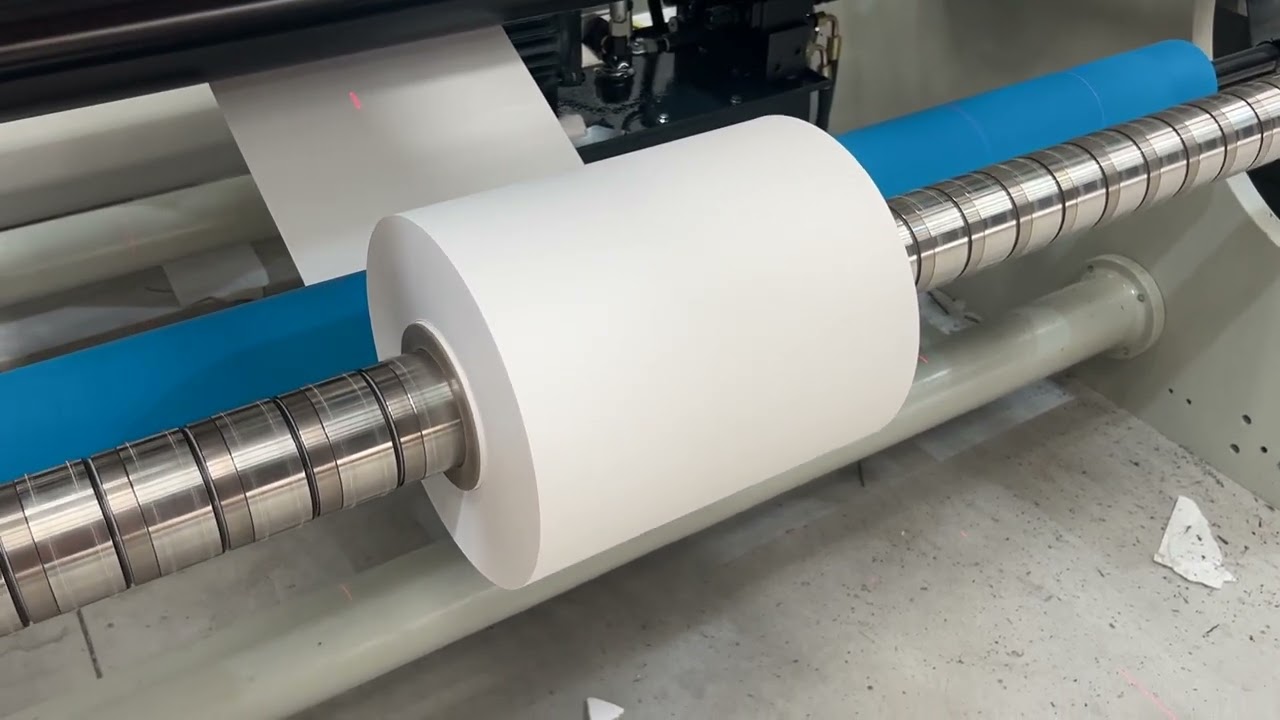 1600 slitting and rewinding machine with auto punshing and rotating unloading rack to Russia
