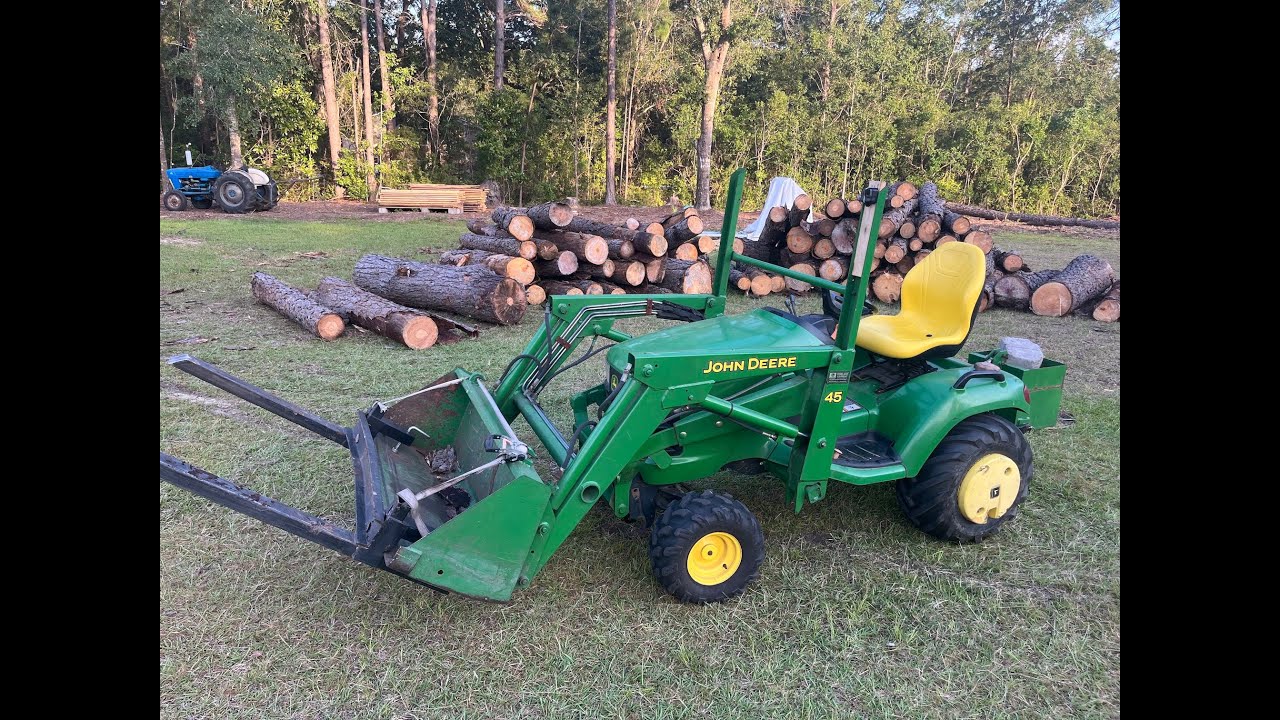 Moving logs with the 45 Loader // John Deere X495 Diesel