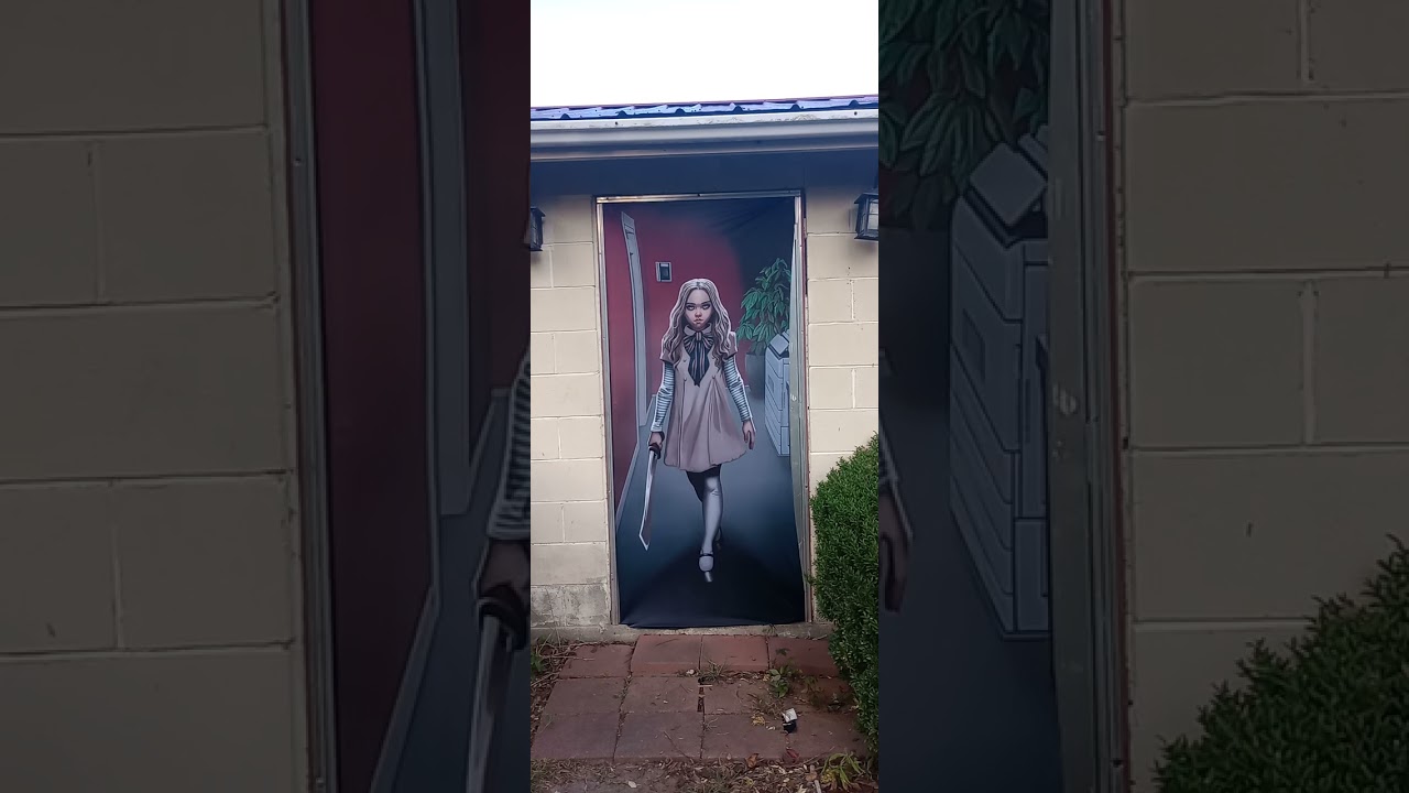 MEGAN(2023)Halloween door cover October 12, 2025