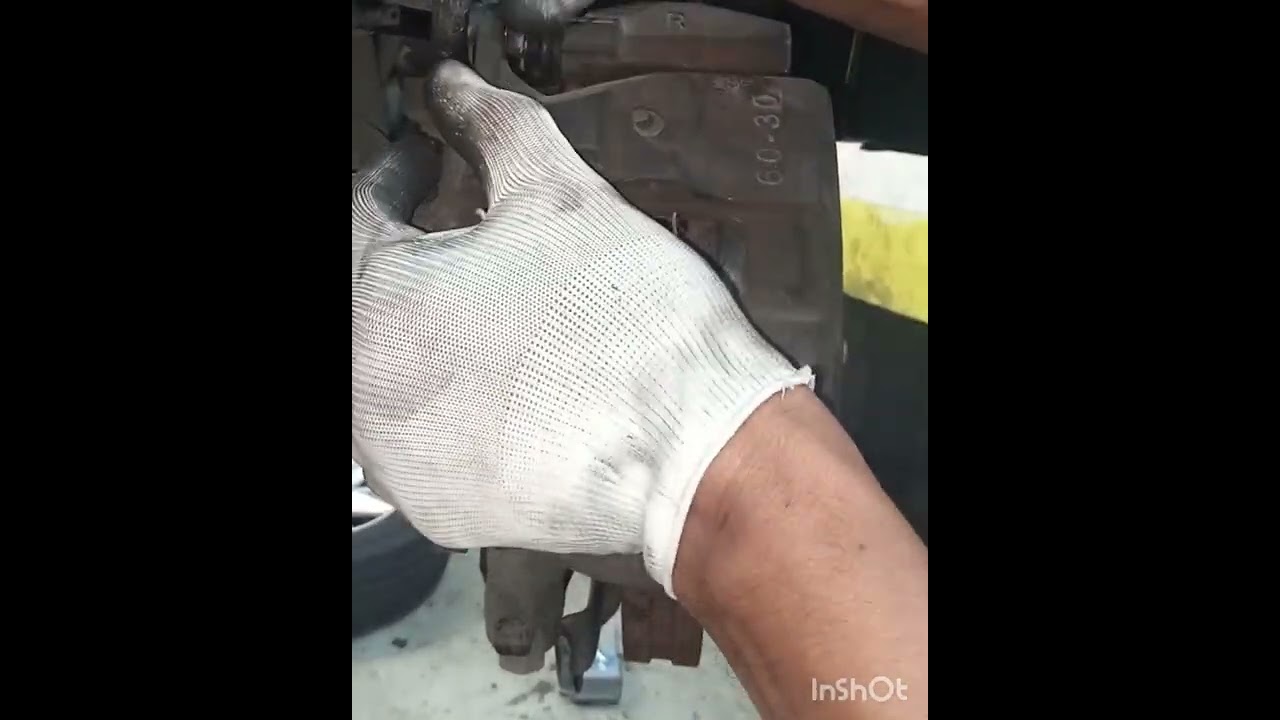Toyota innova replace front brake pads and lubricate sliding pin.