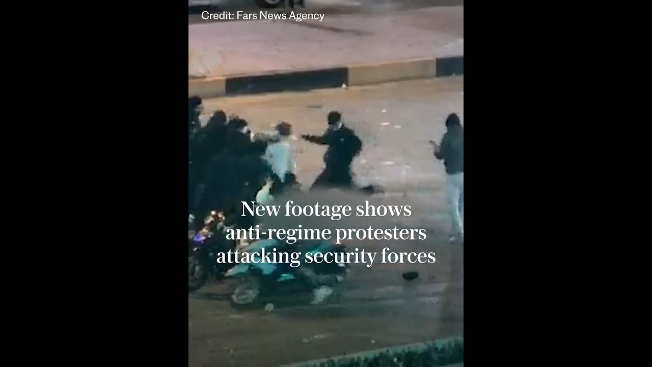Armed protesters fight back against Iranian regime