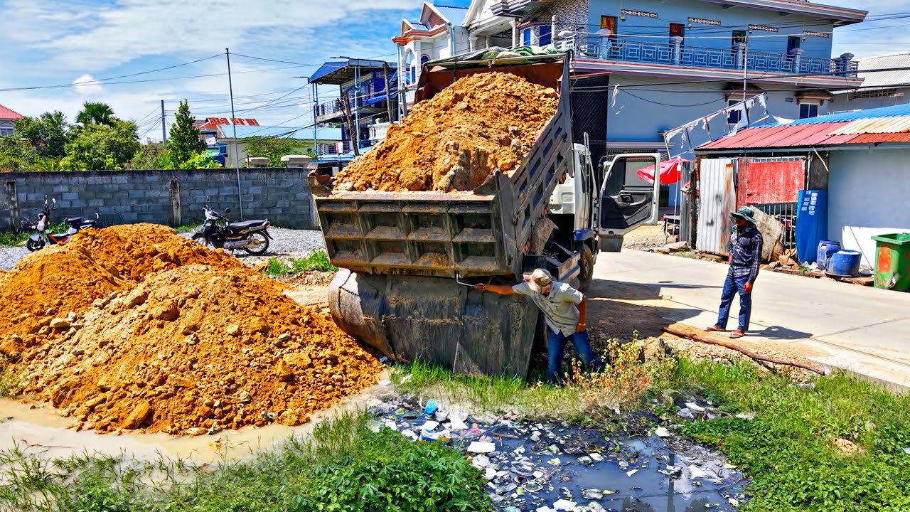 First Starting A New Project! Filling Land By Dump Truck Unloading soil with Komat'Su D20P Dozer