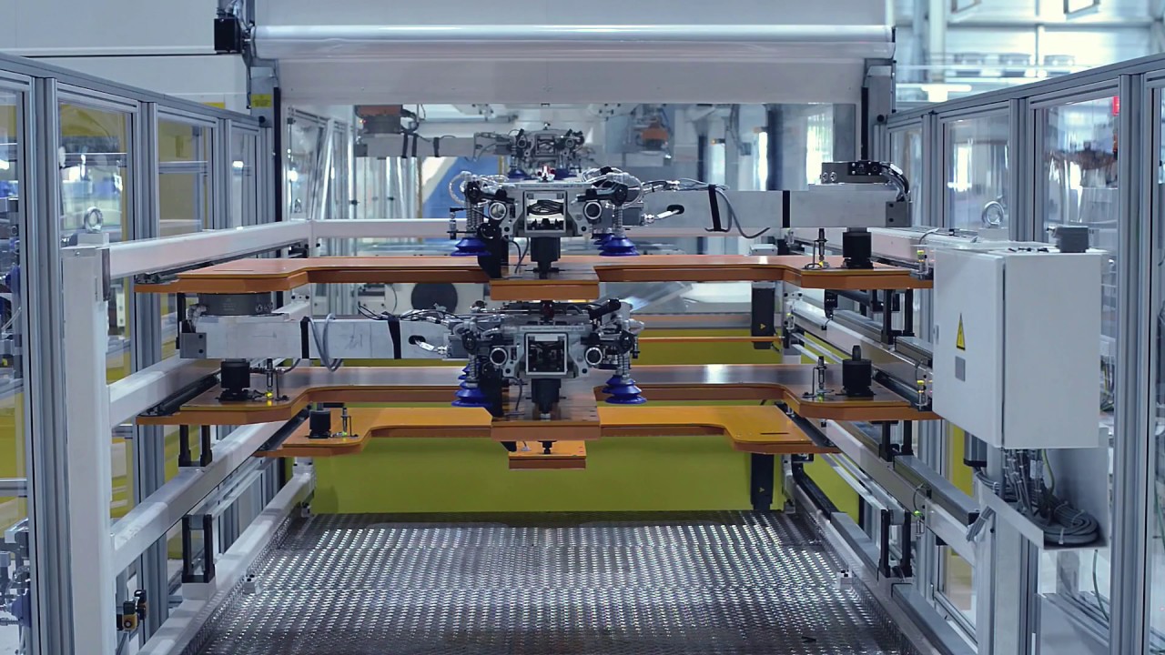 DREHER Automation: Großraumtransferpresse mit Platinenlader