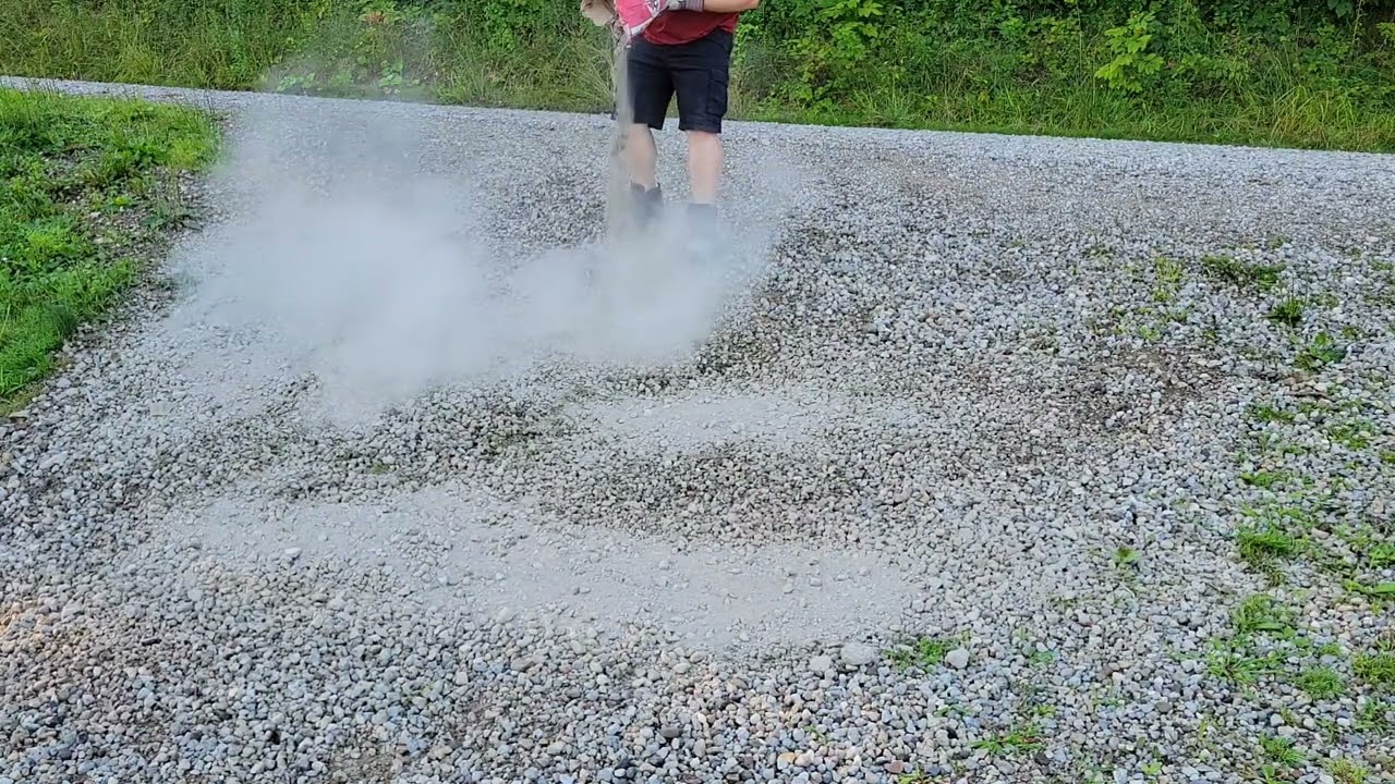 Mixing concrete in with gravel driveway