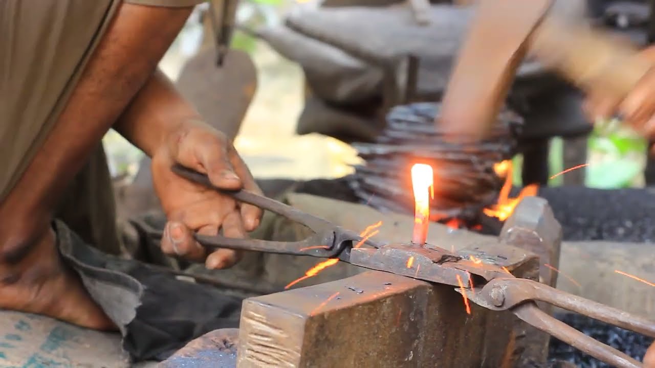 A blacksmith is hard at work making nails.⚒️🔥🔨blacksmith New videos 🔥