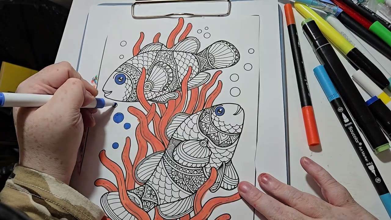 Coloring in random sea book from dollar tree 