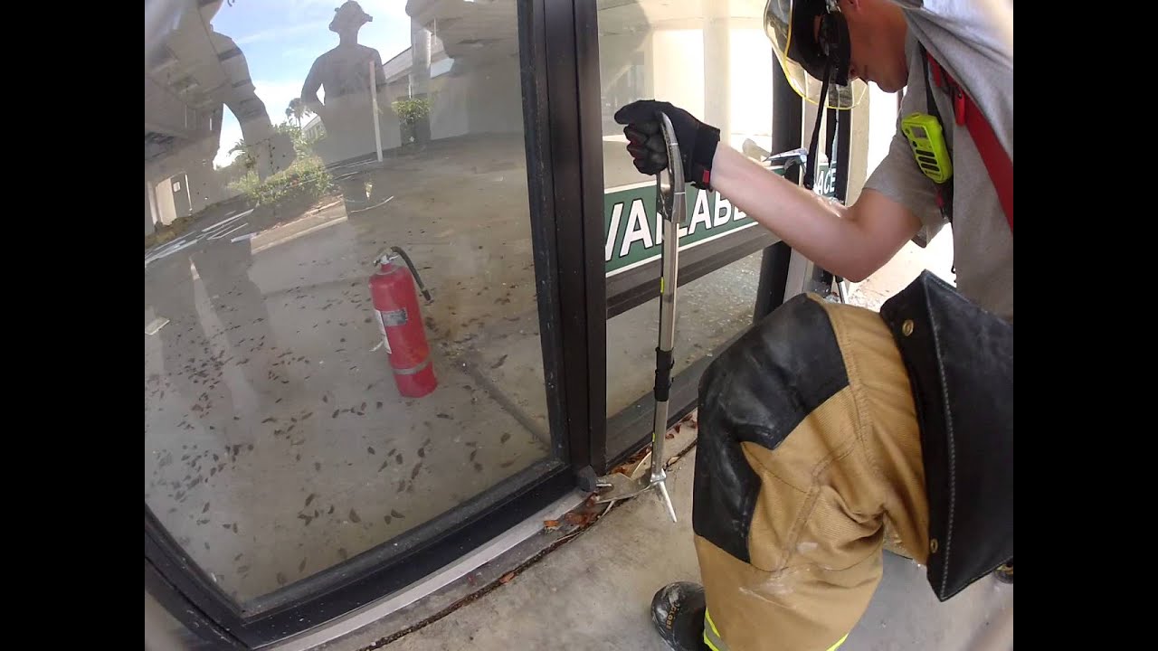 Storefront door removal from pin hinge