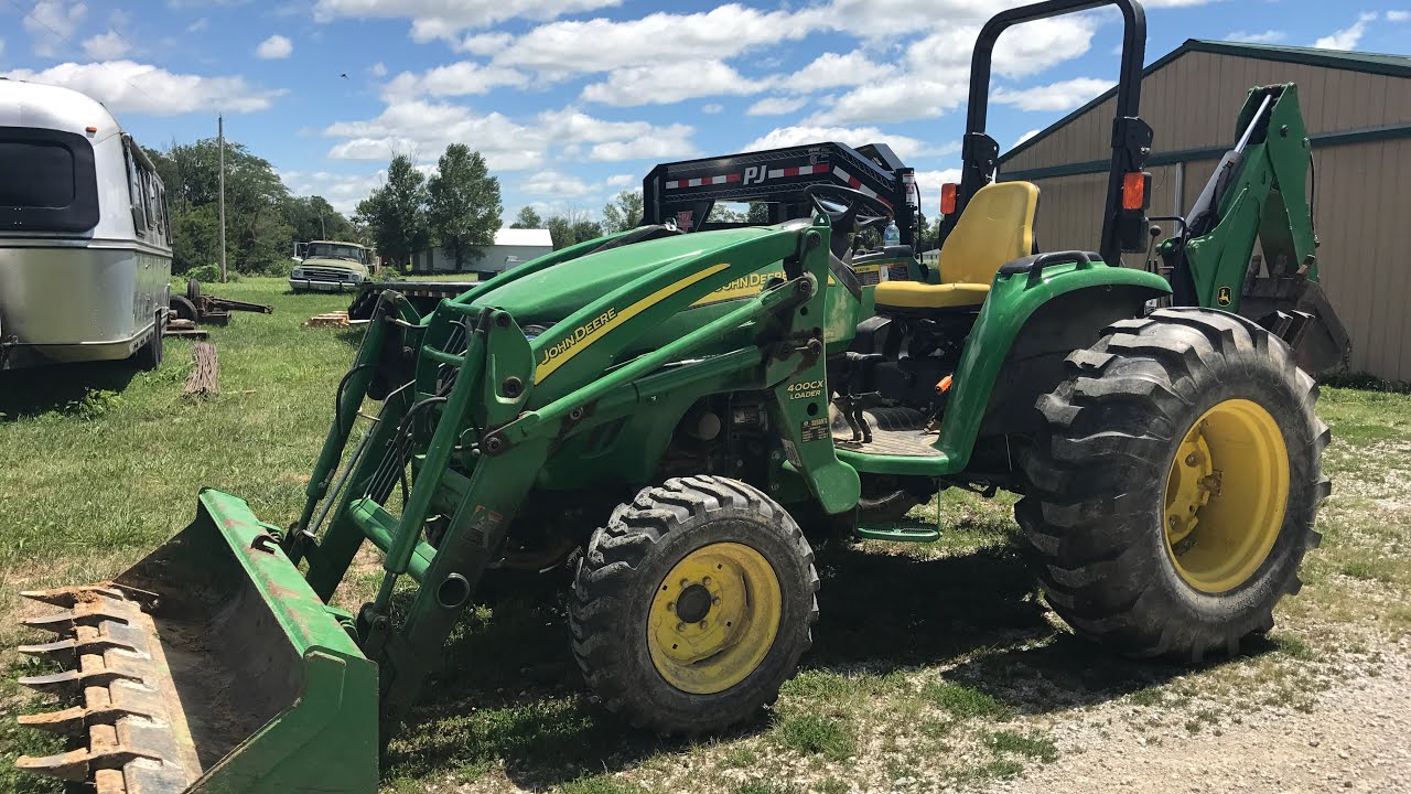 Снятие погрузчика John Deere 400CX (4720)