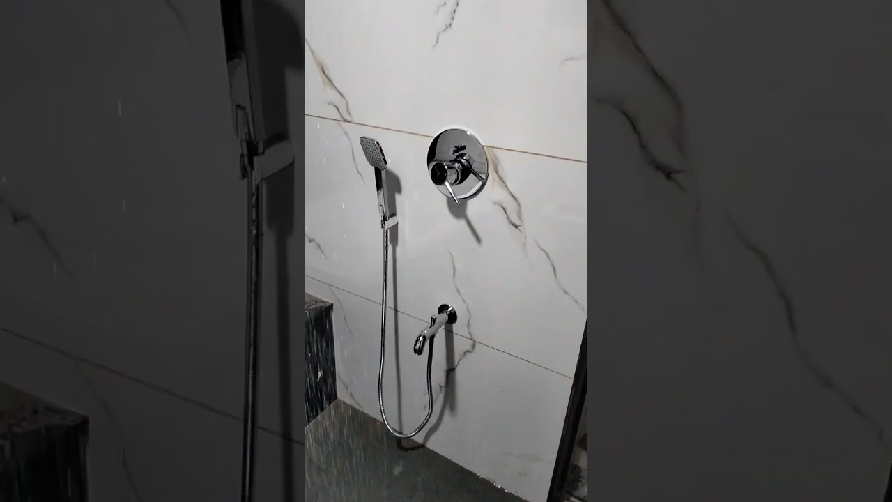 10ft × 8ft comman Bathroom. Diverter fitting with over head Shower,Bathtub and wall mounted cammond