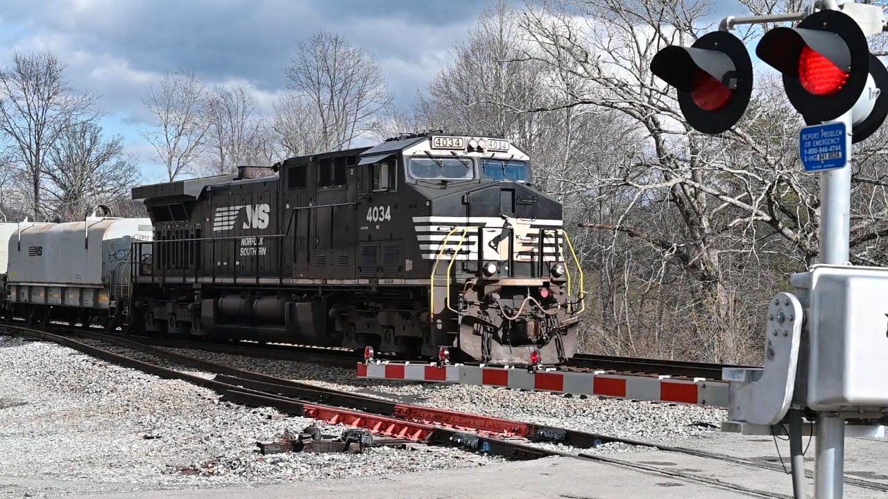 Massive Freight Train Crossing at Railroad Gates