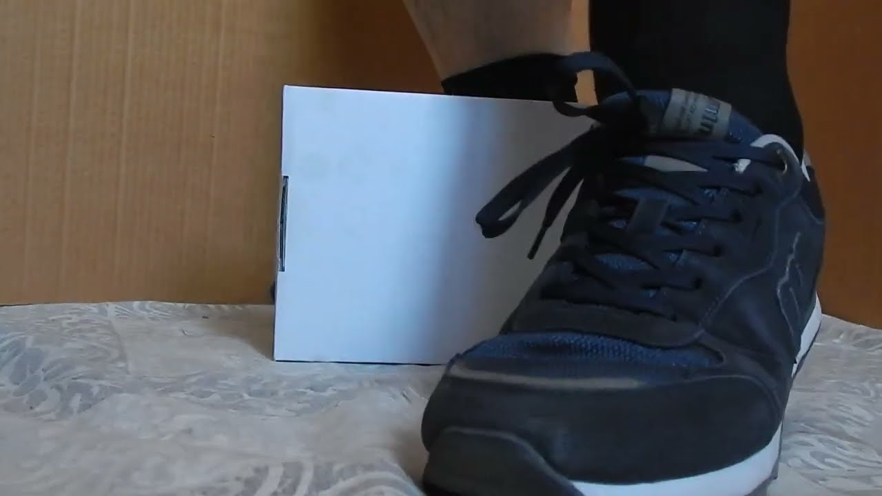 MTNG sneakers stomping cardboard box