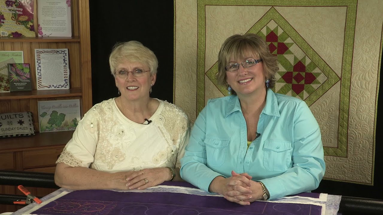 411  Linda V Taylor with Kimmy Brunner. Kimmy shows C curl border design.