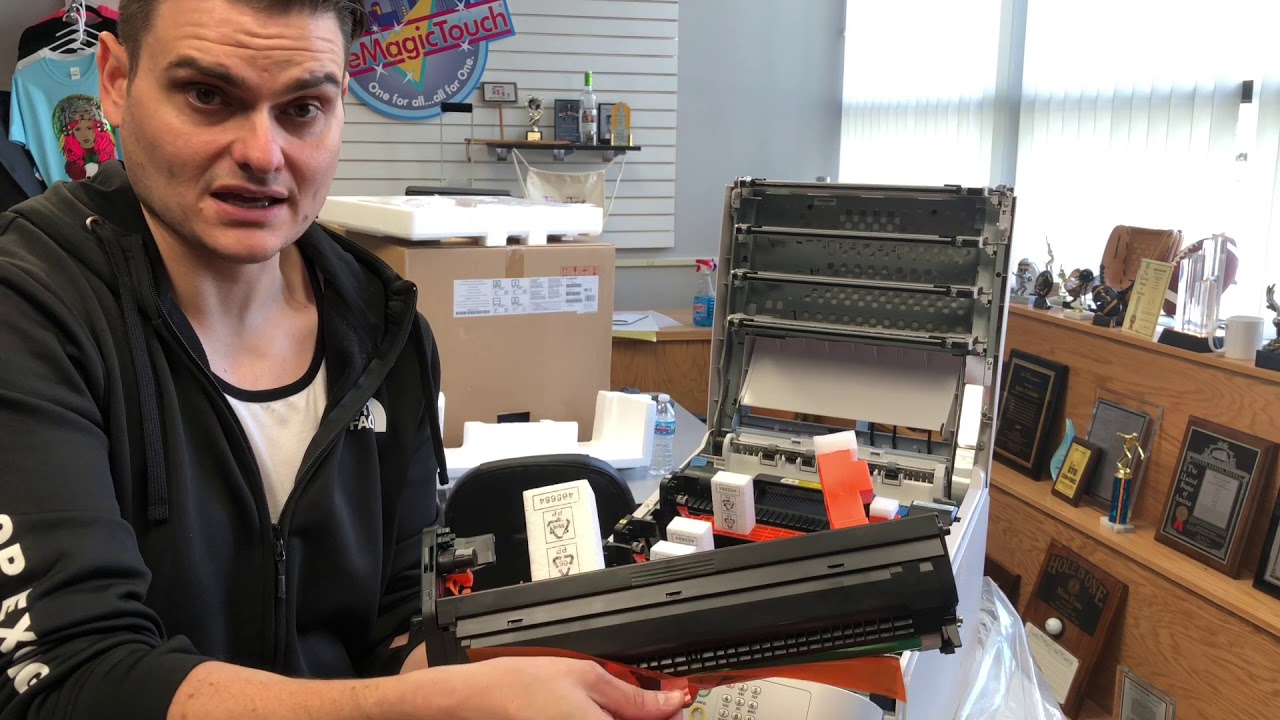 How to unpack an Oki Pro8432WT printer?