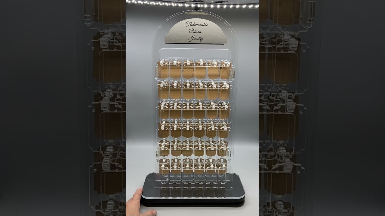 Acrylic rotating earring display from Flatwearable Artisan Jewelry