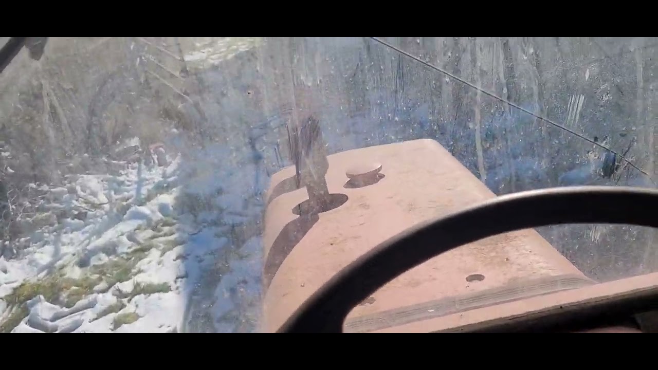 A drive in the snow in a massey ferguson 550
