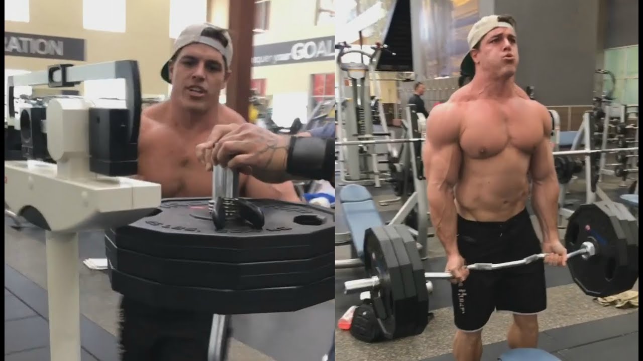 Castleberry Weighs his Plates before lifting them