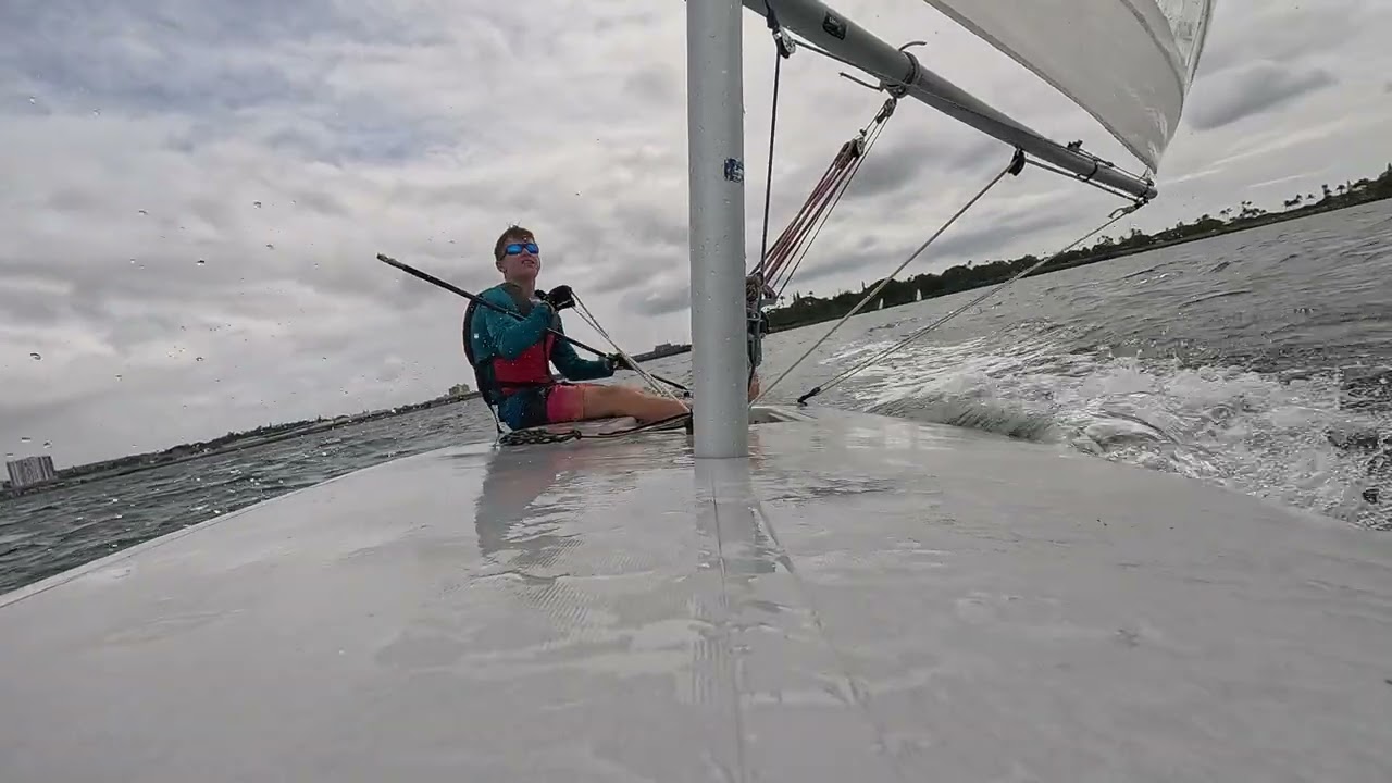 Laser heavy wind reaching! (Bow POV) #sailing #viral #ilca #capsize