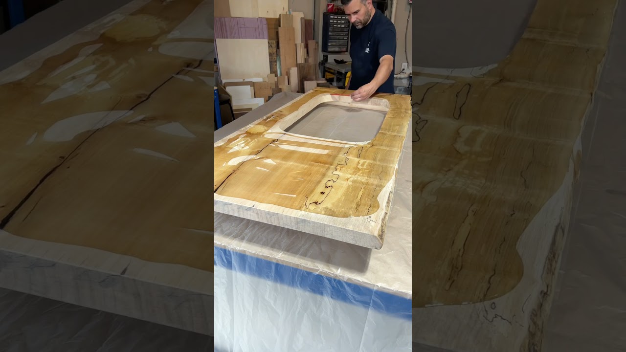 Pouring an epoxy flood coat on this spalted maple kitchen counter top. #woodwork #woodworker #epoxy