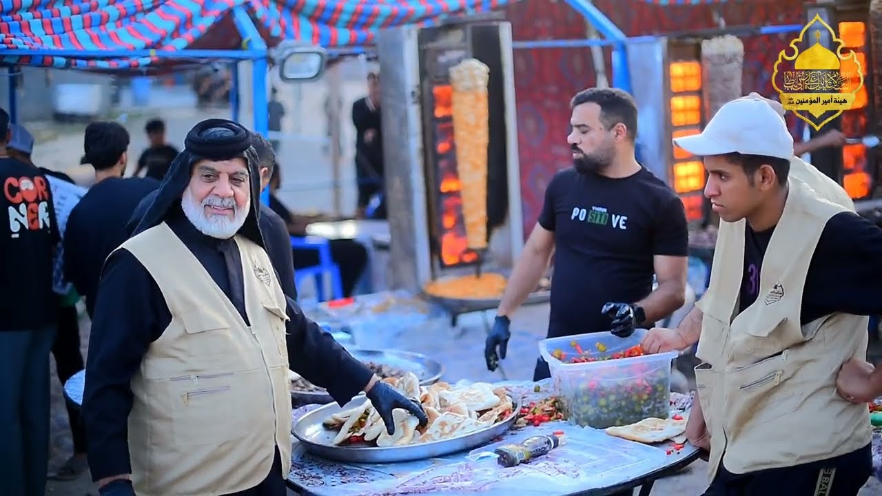 موكب هيئة امير المؤمنين (ع) يقدم الخدمه لزوار الحسين (ع) خدمه مشاية الاربعينيه 