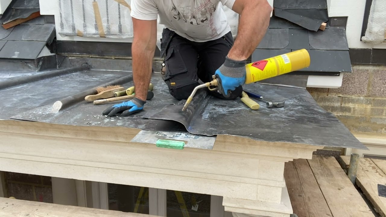 Installing A 4 Bay Code 5 Lead Flat Roof To A Stone Entrance Portico