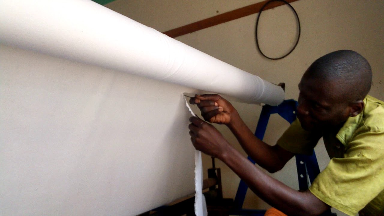 Manually operated Toilet paper machine.