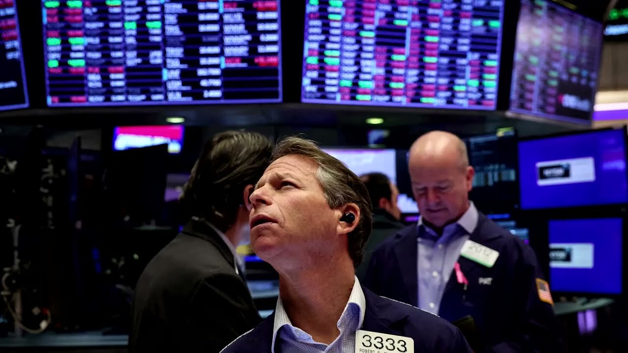 Stocks end slightly lower as focus shifts to data | REUTERS