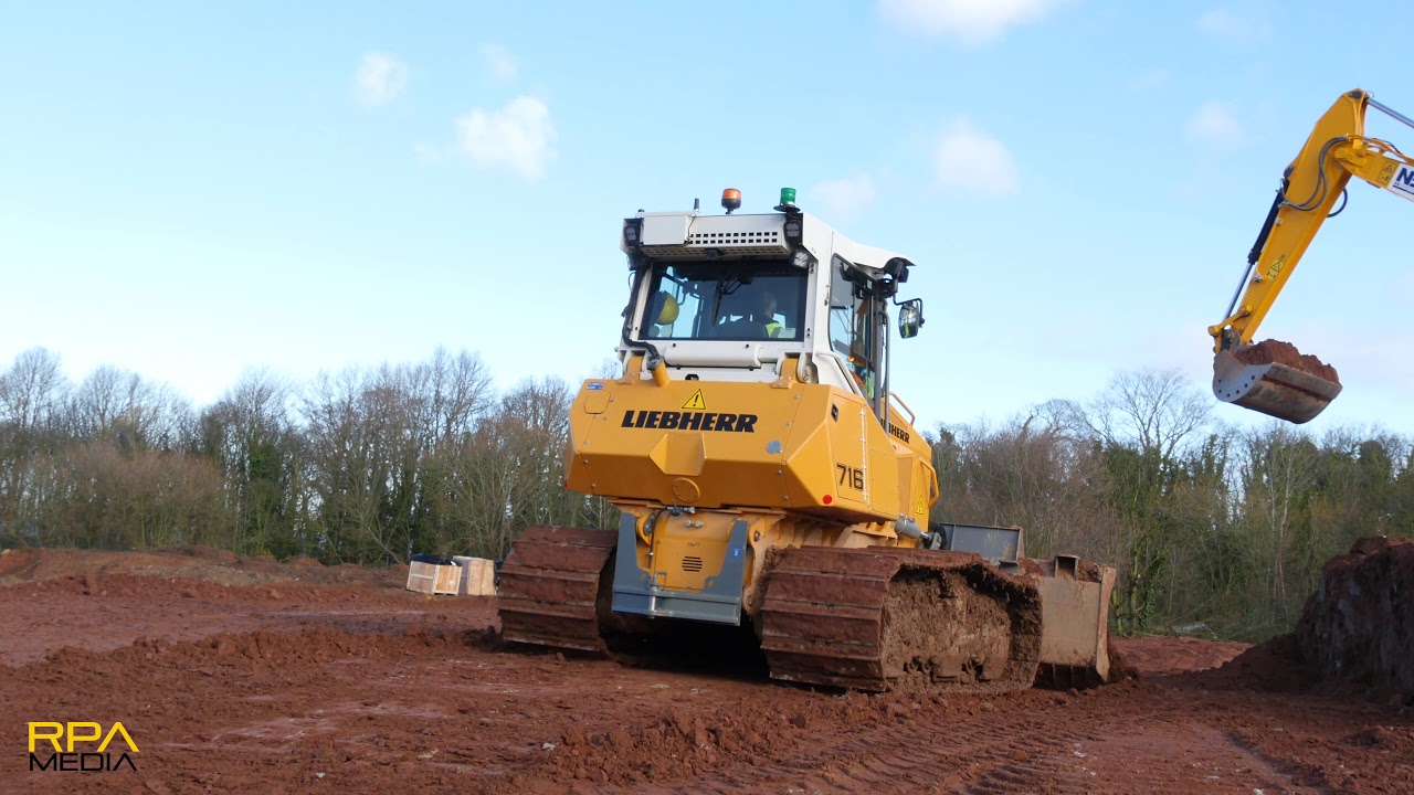 NEW Liebherr PR716 dozer maintaining haul roads.
