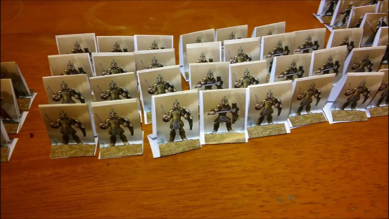 Wargaming on the cheap: Paper miniatures, printed at a public library, "assembled" at home in a day.