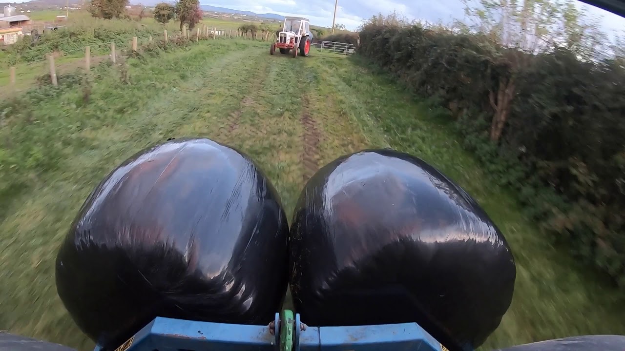 OCTOBER BALING AND STACKING OF ROUND BALES