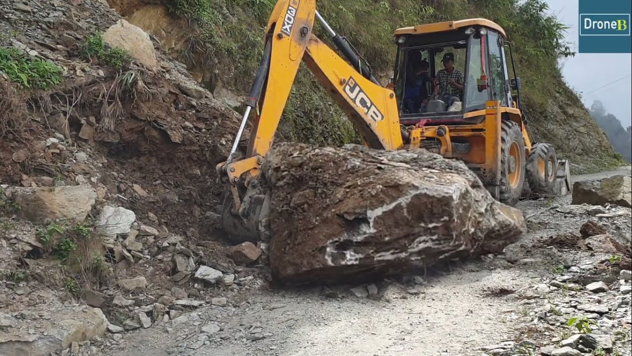 Stone and Land Slide-Backhoe Loader-Clearing Hilly Blocked Road