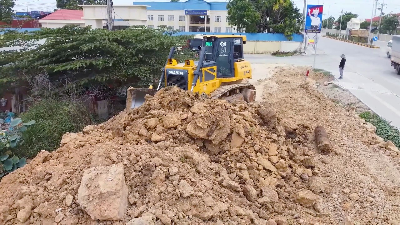 Incredible!! Land Filling Begins Teamwork skilled dozer operator and dump trucks drivers moving soil