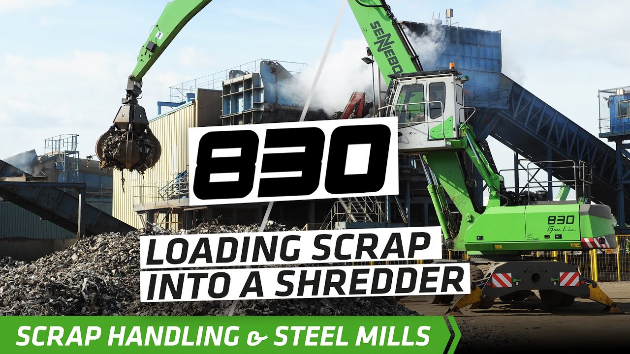 SENNEBOGEN - Scrap Handling: 830 Mobile Material Handler loading scrap into shredder at SIMS, UK