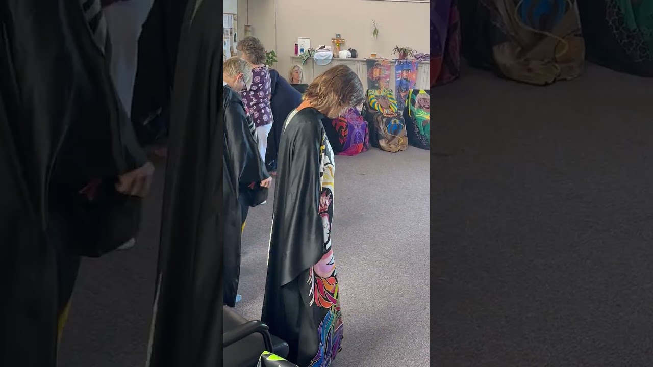 Sacred Robe Experience putting on the Robes
