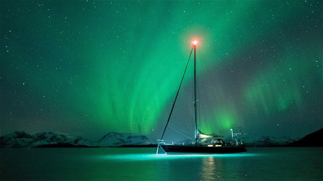 Aurora Borealis in Troms&oslash;, Norway. Sailing under the Northern Lights.
