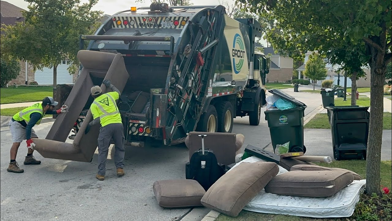Groot Mack MRU McNeilus Rear Loader Garbage Truck Packing Couches & Heavy Bulk Waste at Fall Cleanup