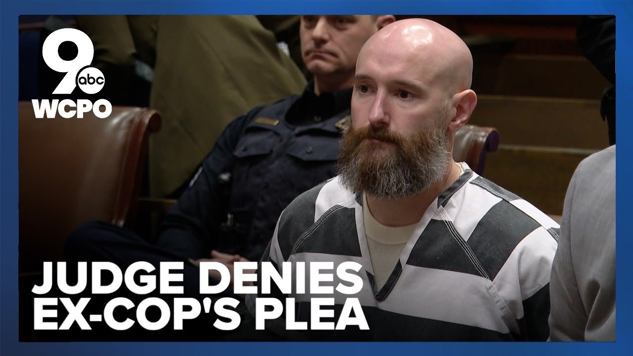 Judge denies early release for ex-cop convicted of armed robbery
