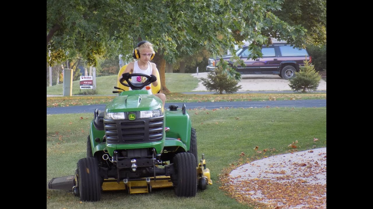 8 year old operates John Deere x738