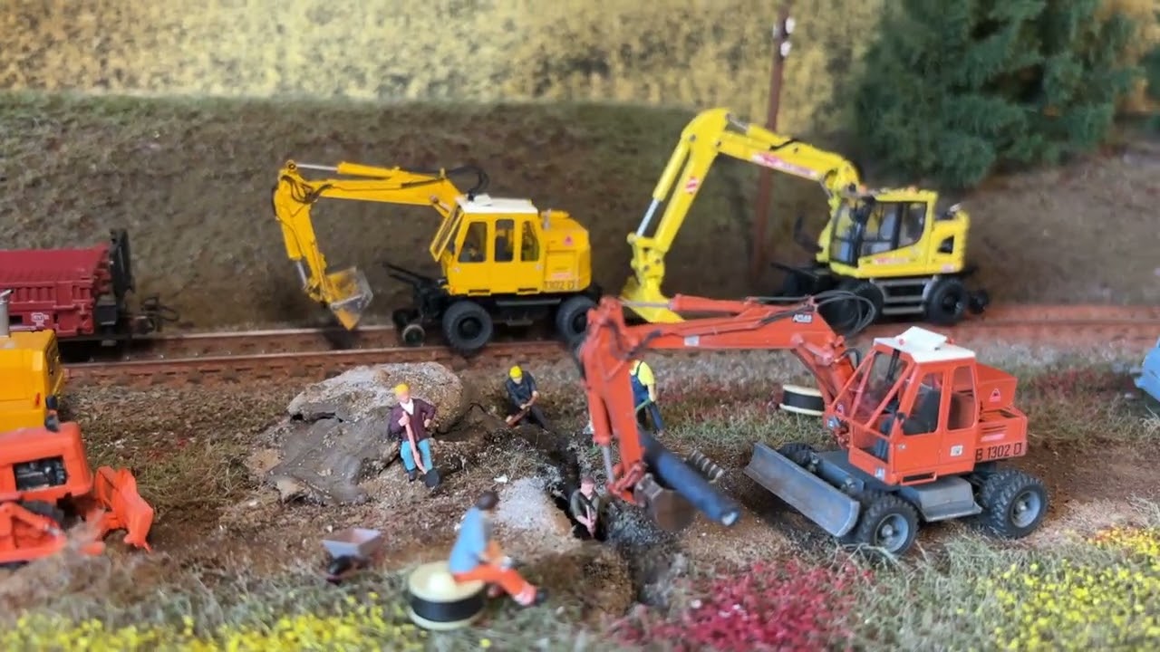 Neu von Artitec 387.636 Atlas Zweiwegebagger für H0 Gleisbaustellen