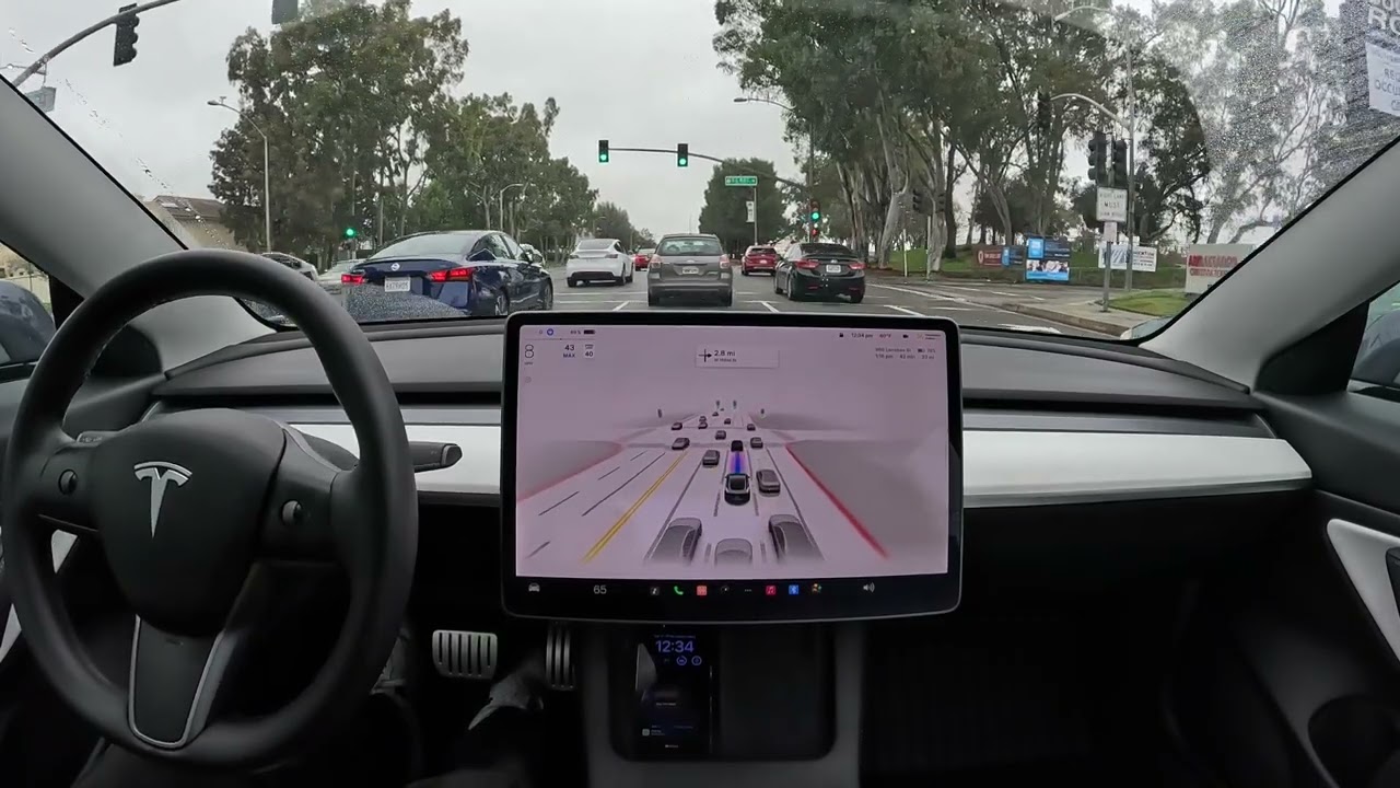 Raw 1x: Rainy Day Driving in Los Angeles on Tesla Full Self-Driving Beta 10.69.25