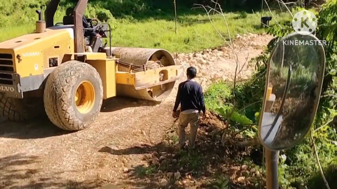 BUILDING NEW ROAD IN BETWEEN RICEFIELDS
