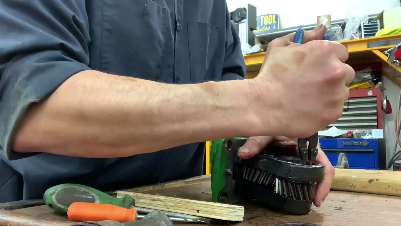 John Deere 3033r Tractor mid PTO removal due to seal leaking.