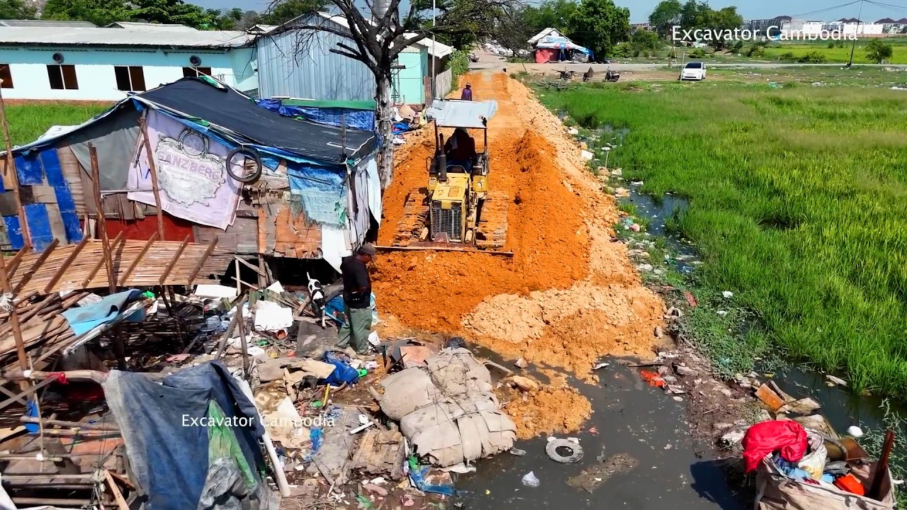 Making New Road At People Living In The Landfill Area By Truck Unload Of Soil Bulldozer Pushing Soil
