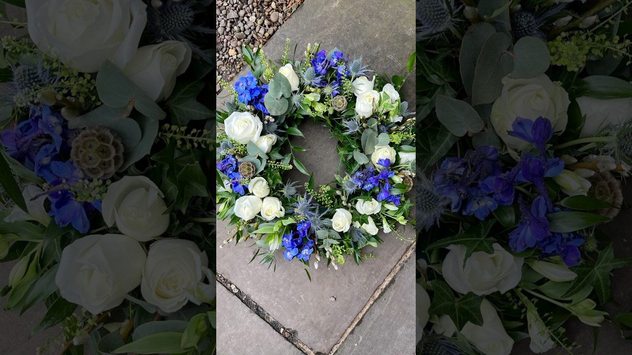 Creating a striking funeral wreath in blue and white #floraltribute #funeralflowers #florist
