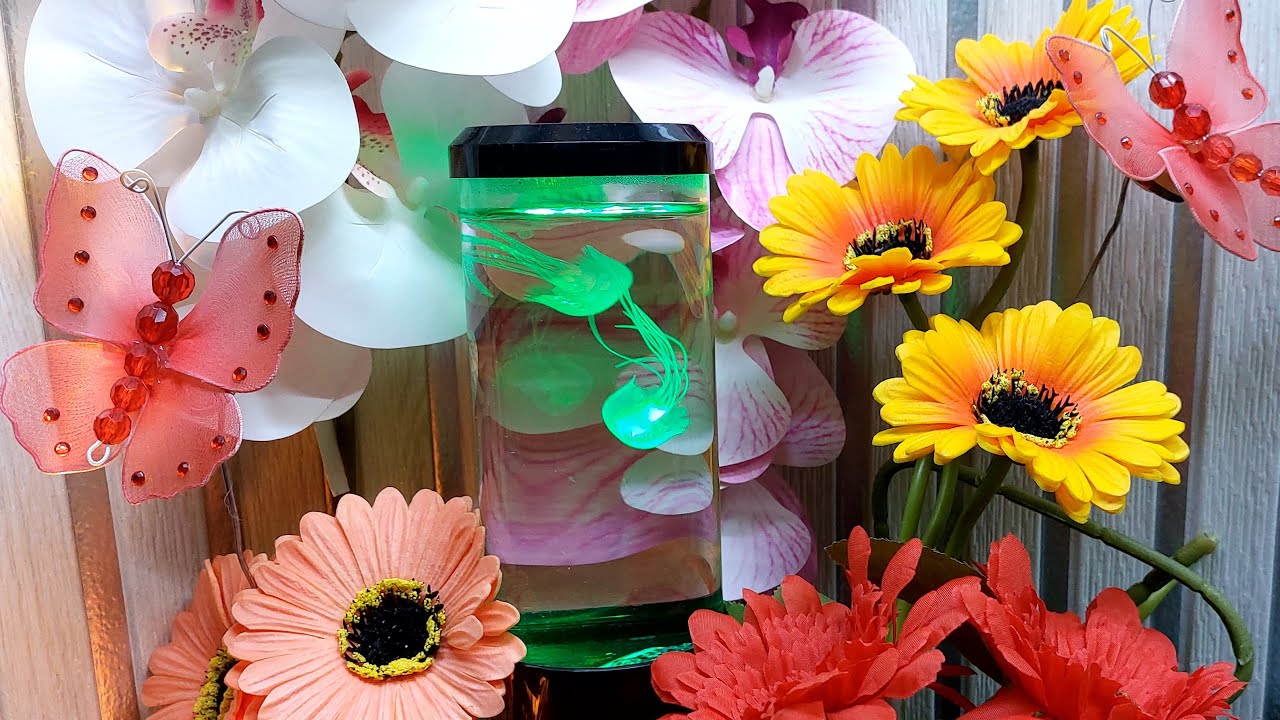 Nena Taripe Licup is on silent live stream with Jelly Fish Lamp and Flowers