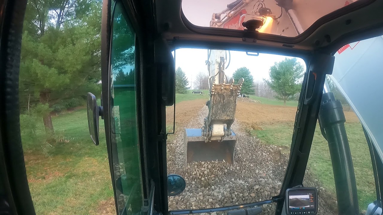 Bobcat e165 spreading stone