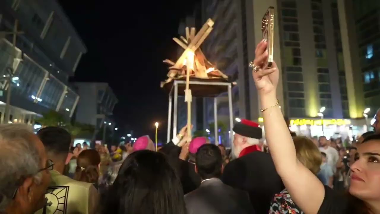 انطلاق مسيرة شعلة الصليب من كنيسة ام النور الى كنائس عنكاوا